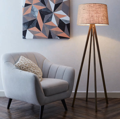 Floor lamp next to an armchair
