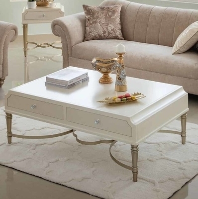 White coffee table with drawers, antique legs and gold detailing 